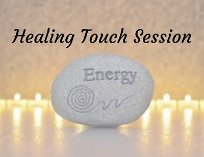 Healing touch session with candles glowing 